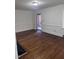 Inviting living room featuring hardwood floors, and access to outdoor patio at 808 Belvedere St, Rocky Mount, NC 27803