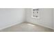 Comfortable bedroom with soft carpeting and a bright window at 808 Hillfarm Dr, Wake Forest, NC 27587