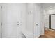Well-lit mudroom area with built-in bench, storage, and access to a tiled shower room at 808 Hillfarm Dr, Wake Forest, NC 27587