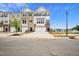 Beautiful new construction townhomes with varied exterior colors and stone accents at 860 Parc Townes Dr # 70, Wendell, NC 27591