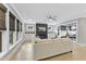 Cozy living room showcasing fireplace, built-in cabinets, natural light and an open floor plan at 1005 Collins Dr, Raleigh, NC 27609