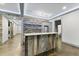 Rustic wet bar featuring stone accents, shelving, and a convenient serving counter at 1005 Collins Dr, Raleigh, NC 27609
