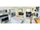 Modern kitchen featuring stainless steel appliances, granite countertops, and an island with seating at 1021 Forest Glen Dr, Raleigh, NC 27603