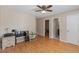 Spacious bedroom with hardwood flooring and ample natural light, creating a cozy atmosphere at 104 N Green St, Selma, NC 27576