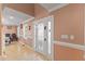 Inviting foyer showcases a decorative front door and views to a dining area at 104 N Green St, Selma, NC 27576