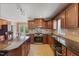 Well-equipped kitchen features granite countertops, stainless steel appliances, and ample cabinetry at 104 N Green St, Selma, NC 27576