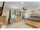 Spacious main bedroom with natural light, ceiling fan, and stylish decor at 104 N Green St, Selma, NC 27576
