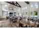 Bright and airy clubhouse featuring tables, lounge area, and fireplace at 108 Boone St, Chapel Hill, NC 27516