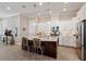 Kitchen with white cabinets, stainless steel appliances, granite countertops, and center island with breakfast bar at 108 Boone St, Chapel Hill, NC 27516