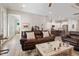 Spacious living room with comfortable seating open to a bright kitchen featuring modern appliances at 108 Boone St, Chapel Hill, NC 27516