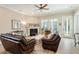 Inviting living room with plush seating, fireplace, and abundant natural light from large windows at 108 Boone St, Chapel Hill, NC 27516
