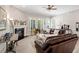 Cozy living room featuring a fireplace and ample natural light, creating a warm and inviting atmosphere at 108 Boone St, Chapel Hill, NC 27516