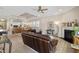 Open floor plan featuring living room with fireplace open to dining area and kitchen with island at 108 Boone St, Chapel Hill, NC 27516