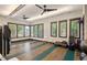 Bright yoga studio with natural light and plenty of room for floor exercises and fitness equipment at 108 Boone St, Chapel Hill, NC 27516