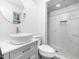 Modern bathroom featuring a stylish vanity, updated fixtures, and a walk-in shower at 1103 Brucemont Dr, Garner, NC 27529