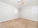 Neutral-toned bedroom with carpet, a ceiling fan, and window with blinds for natural light at 1103 Brucemont Dr, Garner, NC 27529