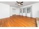 Spacious living room filled with natural light and hardwood floors at 1103 Brucemont Dr, Garner, NC 27529