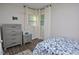 Inviting bedroom featuring lots of natural light, modern furniture, and neutral tones, creating a peaceful retreat at 114 Short E St, Hillsborough, NC 27278