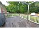 Large outdoor deck with privacy fence, offers a secluded and inviting space for outdoor living and enjoyment at 114 Short E St, Hillsborough, NC 27278
