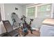 Bright exercise room with workout equipment and natural light, promoting a healthy and active lifestyle at 114 Short E St, Hillsborough, NC 27278