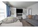 Cozy living room featuring built-in bookshelves, modern decor, and soft lighting for a welcoming ambiance at 114 Short E St, Hillsborough, NC 27278