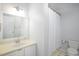Bright bathroom featuring a clean vanity and shower at 1149 Highway Nc 87, Pittsboro, NC 27312