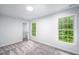 Neutral bedroom featuring lots of natural light from two windows at 1149 Highway Nc 87, Pittsboro, NC 27312