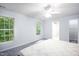 Bright bedroom with plush carpet and an ensuite bathroom for added convenience at 1149 Highway Nc 87, Pittsboro, NC 27312