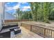 Outdoor deck featuring comfortable furniture, ideal for relaxation and entertainment at 115 Parkers Gate Dr, Youngsville, NC 27596