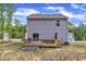The property features a back deck perfect for outdoor entertaining and relaxation at 115 Parkers Gate Dr, Youngsville, NC 27596