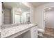 Bathroom with granite countertop, white cabinets, and a glass-enclosed shower at 115 Parkers Gate Dr, Youngsville, NC 27596