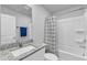 Bathroom with granite countertop, shower/tub combo and neutral walls at 115 Parkers Gate Dr, Youngsville, NC 27596
