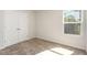 Bedroom featuring a closet with doors and a window at 115 Parkers Gate Dr, Youngsville, NC 27596