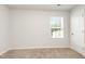 Bedroom featuring natural light and carpeted floors at 115 Parkers Gate Dr, Youngsville, NC 27596
