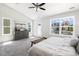 Bright bedroom with windows and modern decor at 1211 Brown Velvet Ln, Apex, NC 27523