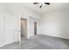 Spacious bedroom with neutral walls and carpet, featuring two closets for ample storage at 1211 Brown Velvet Ln, Apex, NC 27523