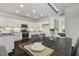 Dining room with view of the kitchen and cabinets at 1211 Brown Velvet Ln, Apex, NC 27523