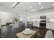 Bright dining room open to the kitchen featuring modern decor at 1211 Brown Velvet Ln, Apex, NC 27523