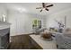 Bright living room featuring modern decor, hardwood floors, and a stylish area rug at 1211 Brown Velvet Ln, Apex, NC 27523