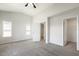 Bright main bedroom with vaulted ceiling and ensuite bath plus a walk-in closet at 1211 Brown Velvet Ln, Apex, NC 27523