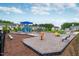 Community playground with colorful play equipment, slides, swings, and benches at 1211 Brown Velvet Ln, Apex, NC 27523