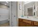 This is a bathroom with a shower/tub, a vanity, and a mirror at 128 Madison Ct, Siler City, NC 27344
