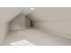 Large bonus room featuring plush carpeting, neutral walls, and natural light from windows at 128 Madison Ct, Siler City, NC 27344