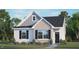 Charming single-Gathering home featuring a mix of brick, siding, and a well-manicured front lawn at 1304 White Verona Way, Knightdale, NC 27545
