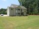 Large backyard with newly installed sod, perfect for outdoor activities and entertaining at 1444 Old Apex Rd, Cary, NC 27513