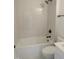 This bathroom features tiled shower walls and sleek black fixtures at 1444 Old Apex Rd, Cary, NC 27513