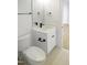 Modern bathroom with a sleek vanity, minimalist mirror, and matching fixtures at 1444 Old Apex Rd, Cary, NC 27513