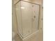 Modern bathroom features a large glass enclosed shower with white subway tile at 1444 Old Apex Rd, Cary, NC 27513