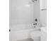 Well-lit bathroom with a combination bathtub/shower and modern fixtures at 1444 Old Apex Rd, Cary, NC 27513