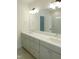 Elegant bathroom with double sink vanity and large mirror reflecting natural light at 1444 Old Apex Rd, Cary, NC 27513